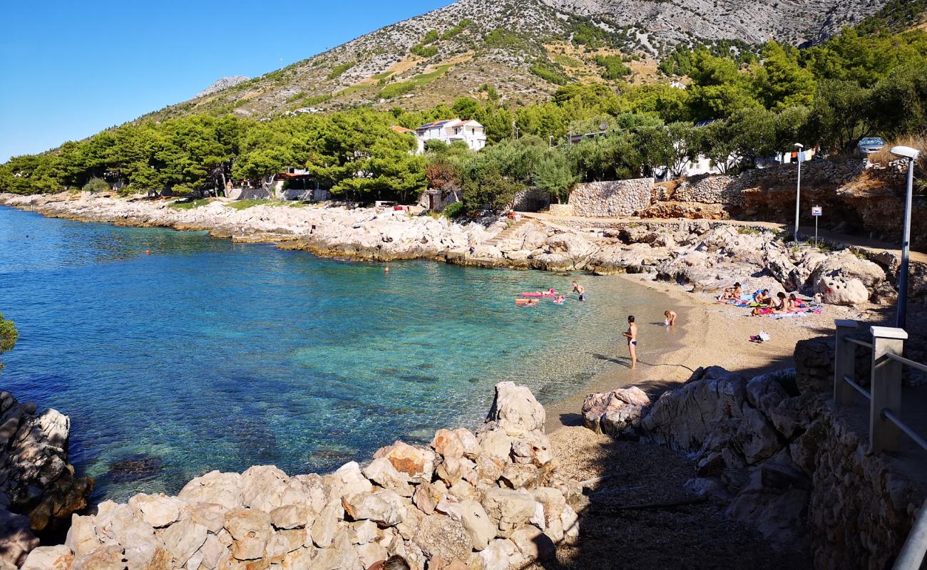 Фото Stela beach с светлая галька поверхностью