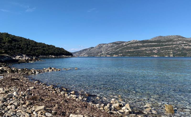 Фото Korcula beach с светлая галька поверхностью