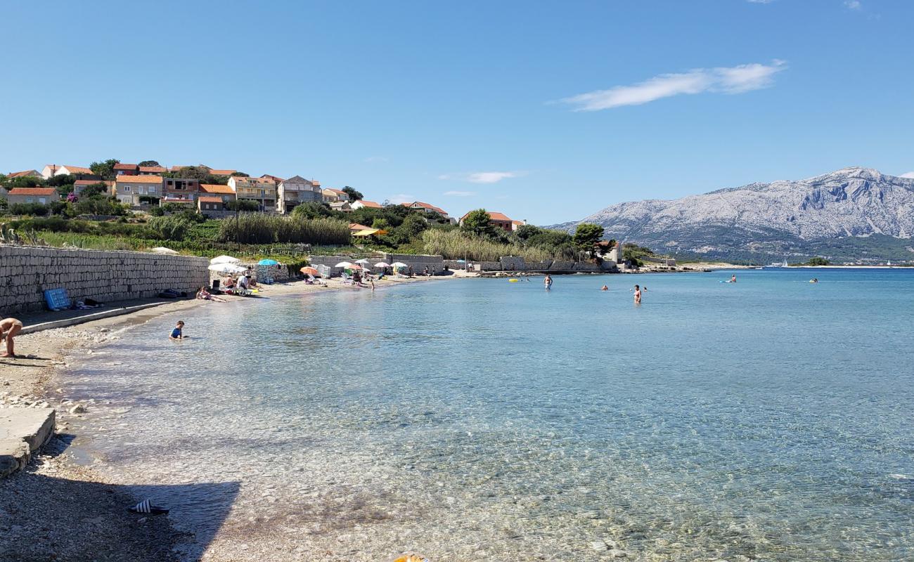 Фото Bilin Zal beach с светлый песок поверхностью