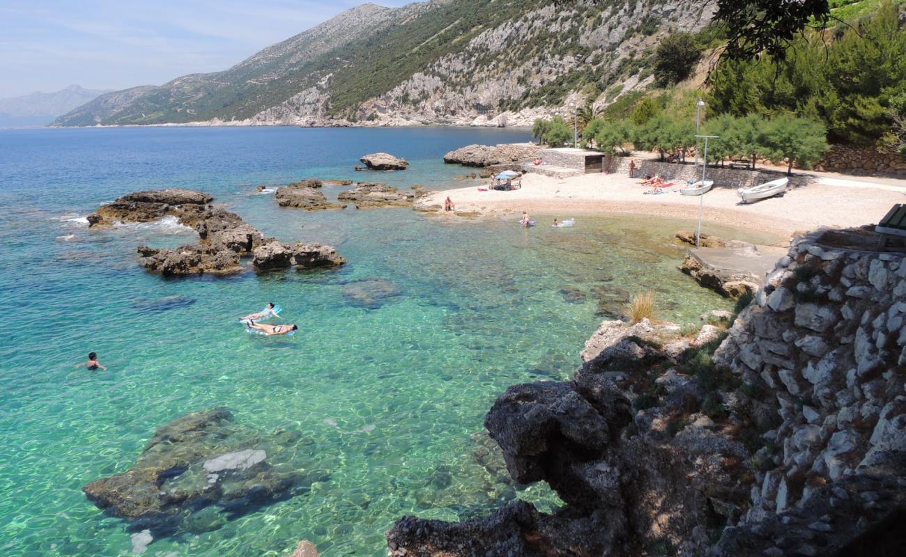 Фото Borak II beach с белая чистая галька поверхностью