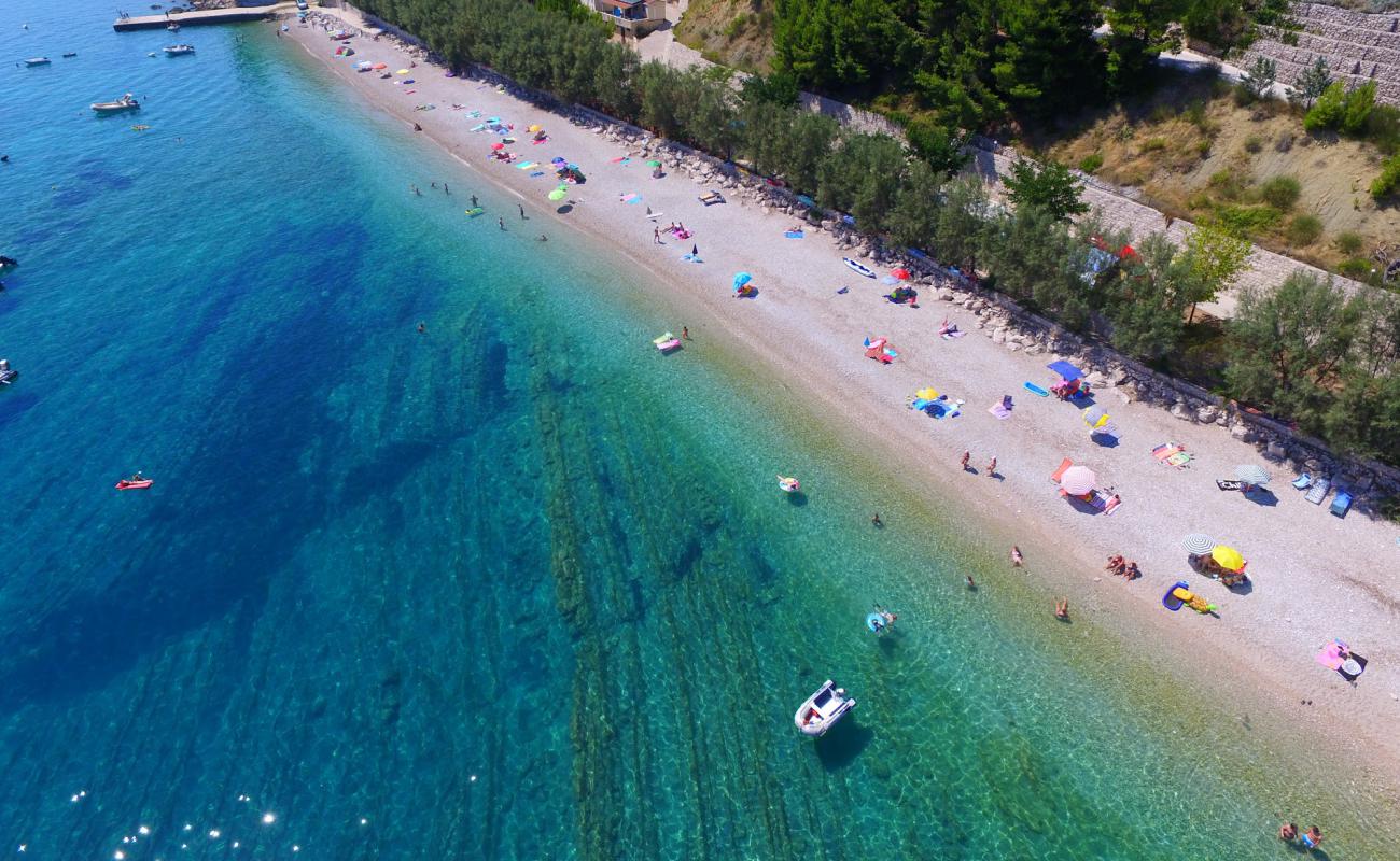 Фото Camp Nevio beach с белая галька поверхностью