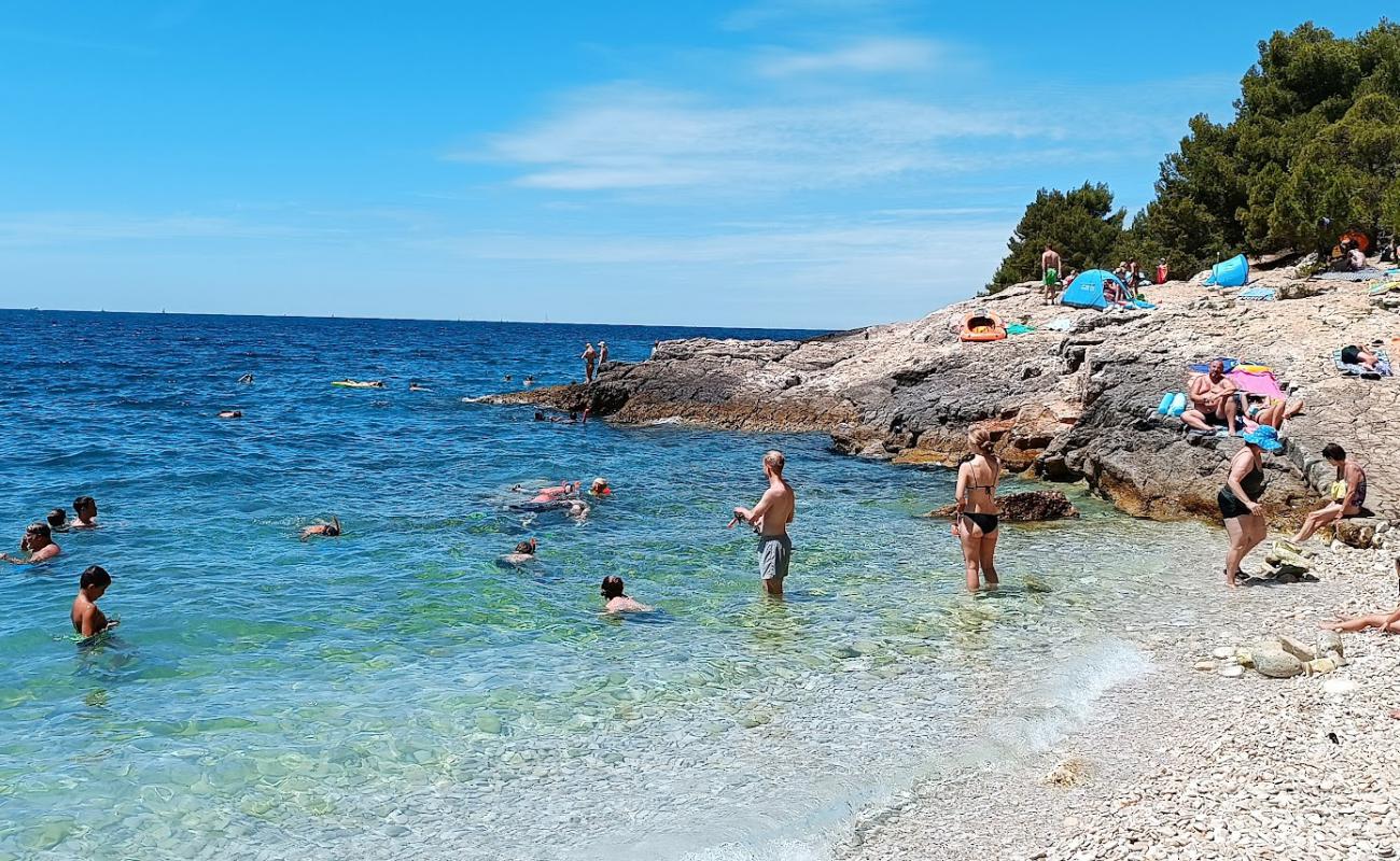 Фото Beach Pinizule с светлая галька поверхностью