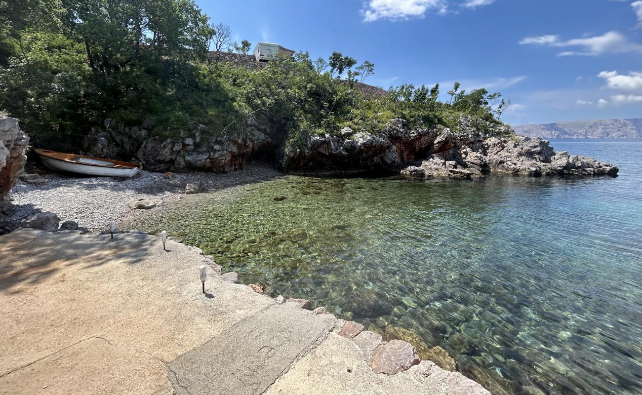 Фото Leso Beach с камни поверхностью