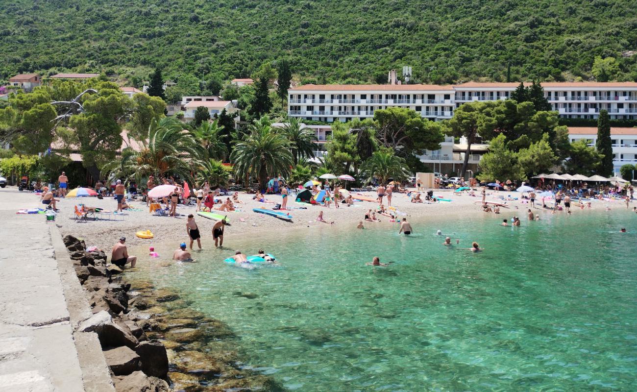 Фото Pozora Beach с серая галька поверхностью