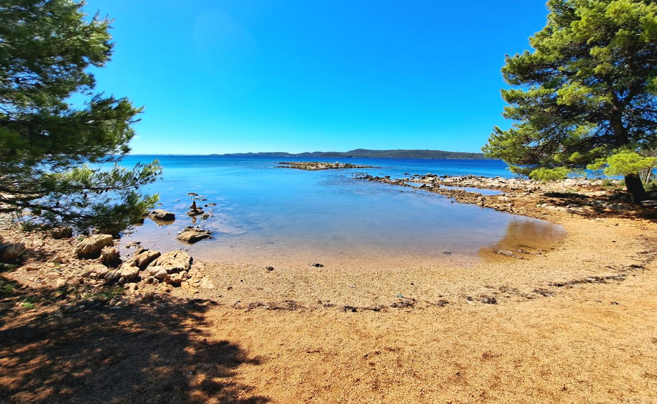 Фото Dog Beach Ugljan с камни поверхностью