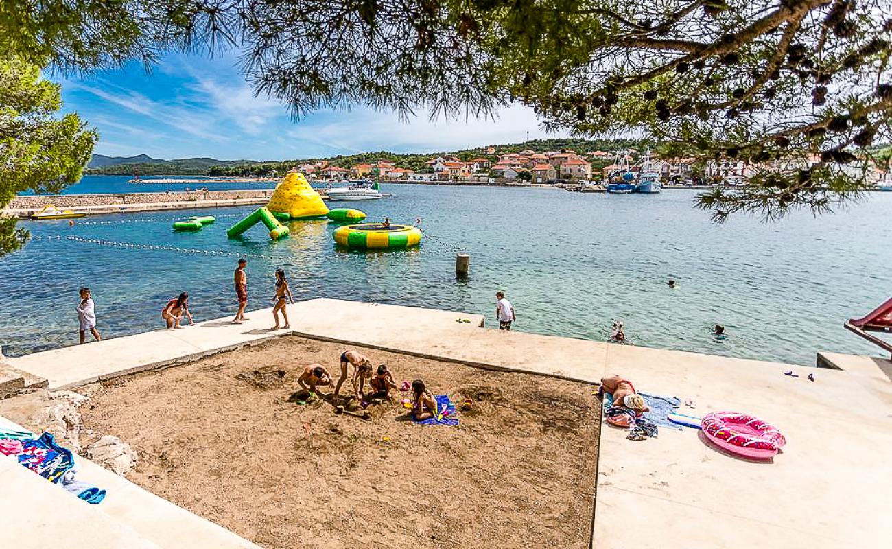 Фото Beach Zelena Punta с камни поверхностью