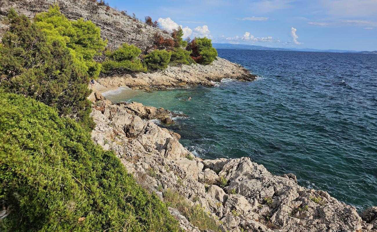 Фото Mala Draga Beach с светлая галька поверхностью