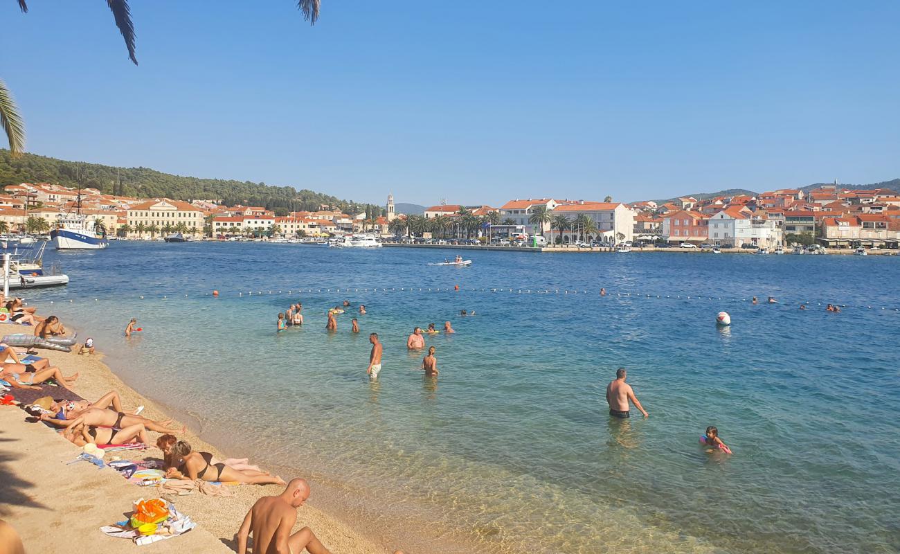 Фото Beach Poseidon с белая чистая галька поверхностью