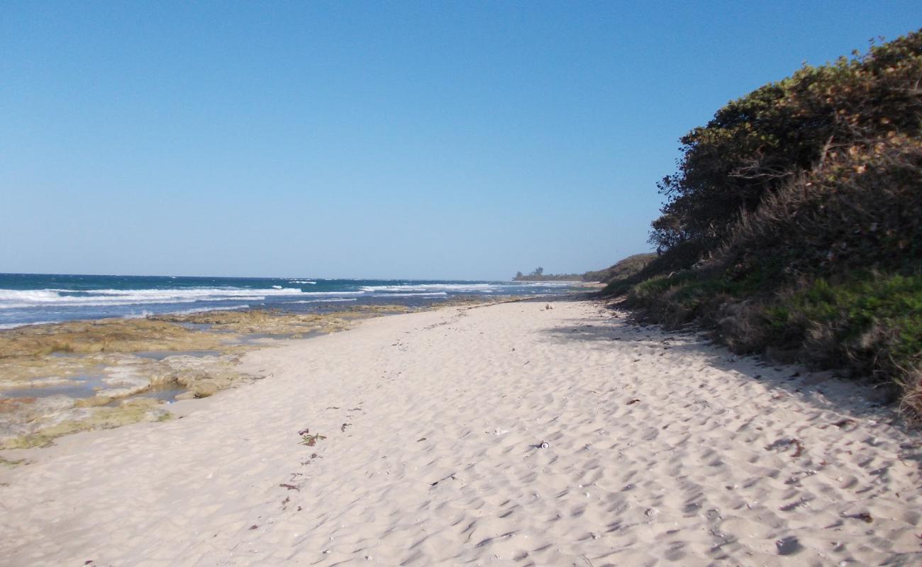 Фото Los Cocos beach с песок с камнями поверхностью