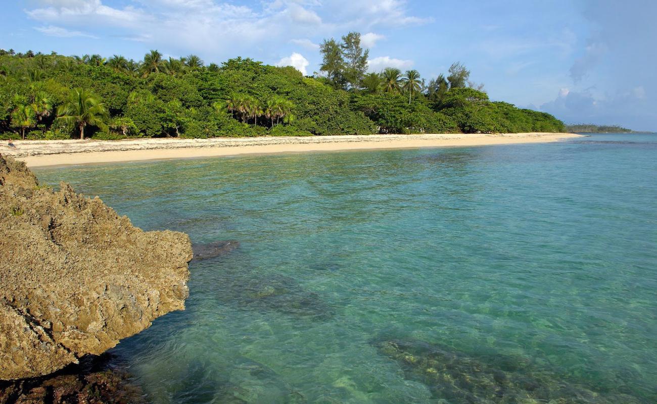 Фото Playa Maguana с золотистый песок поверхностью