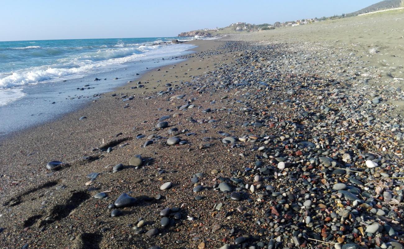 Фото Sotiroulla beach с песок с галькой поверхностью