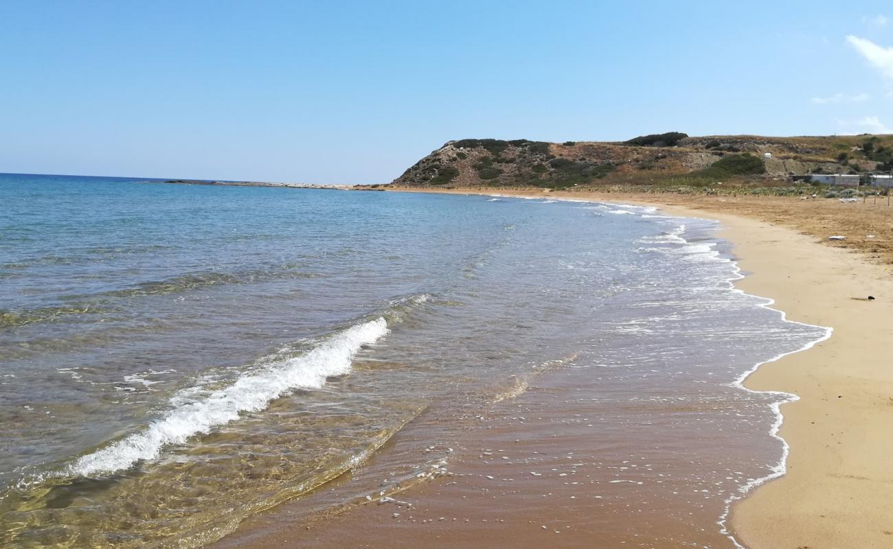 Фото Kaplica beach с золотистый песок поверхностью