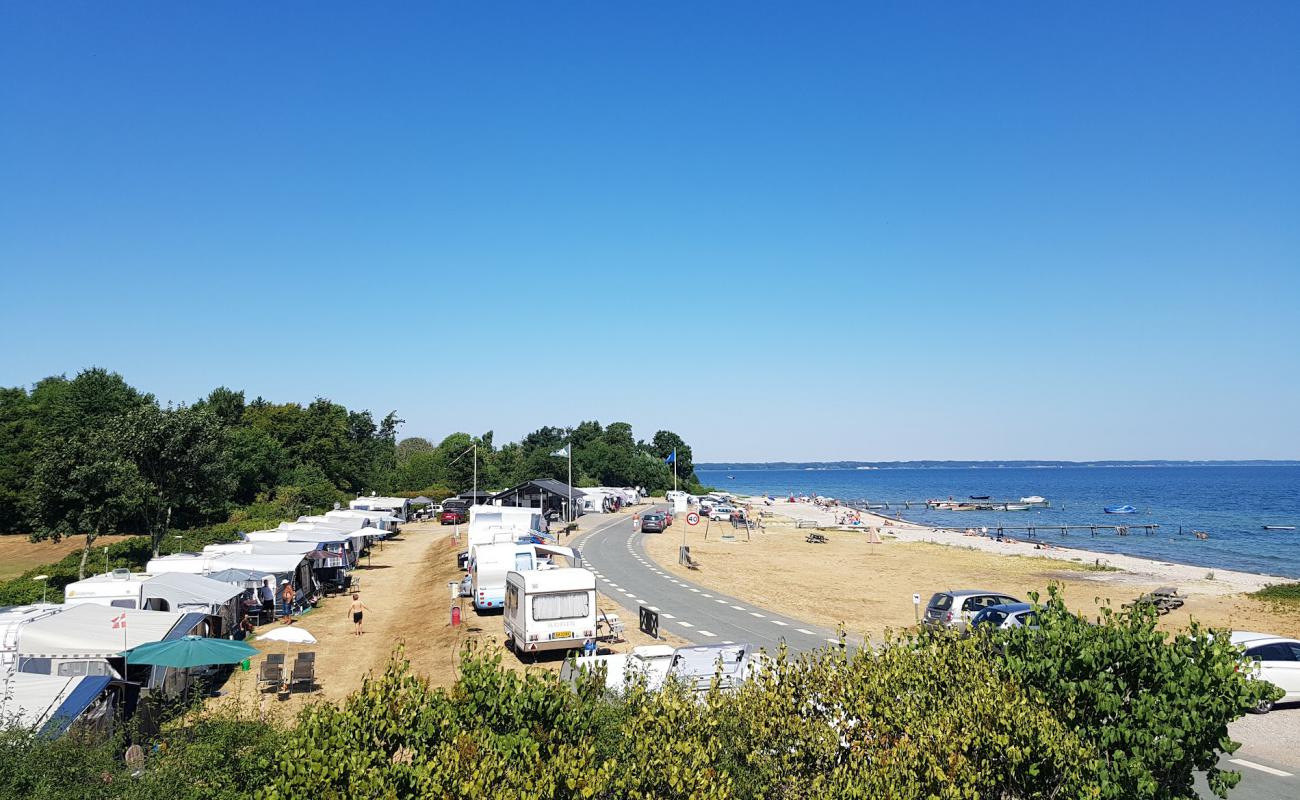 Фото Loddenhoj Beach с песок с галькой поверхностью