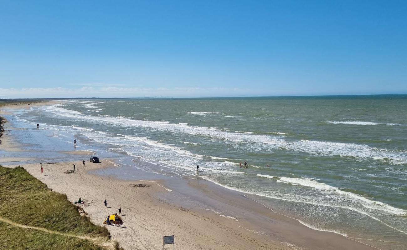 Фото Skiveren Beach с золотистый песок поверхностью