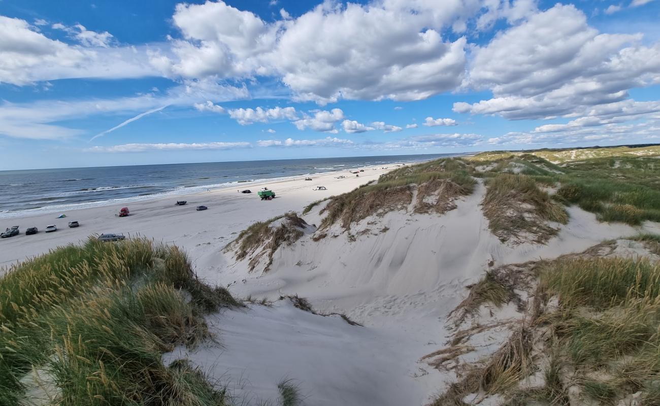 Фото Borsmos Beach с золотистый песок поверхностью