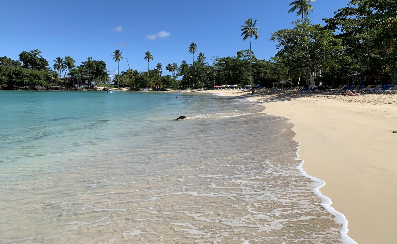 Фото Playa Rincon с золотистый песок поверхностью