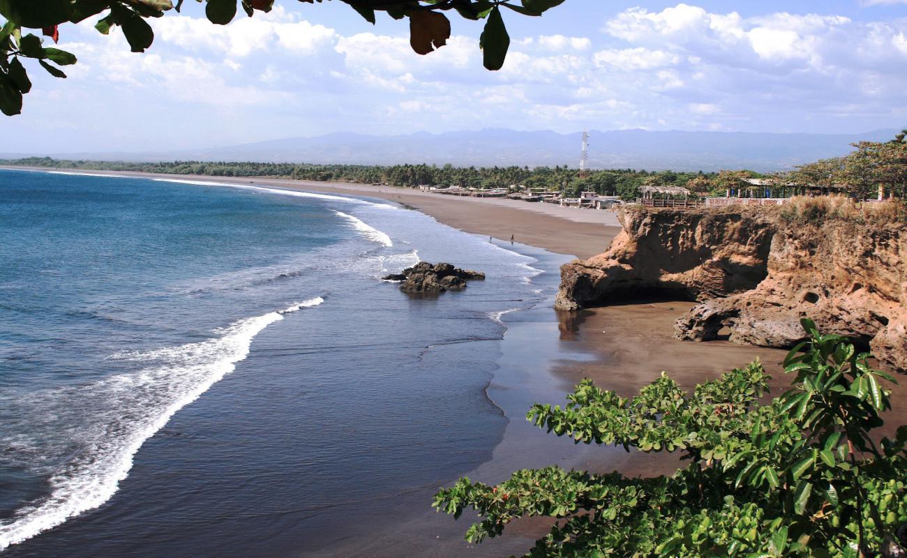 Фото Acajutla Beach с темный песок поверхностью