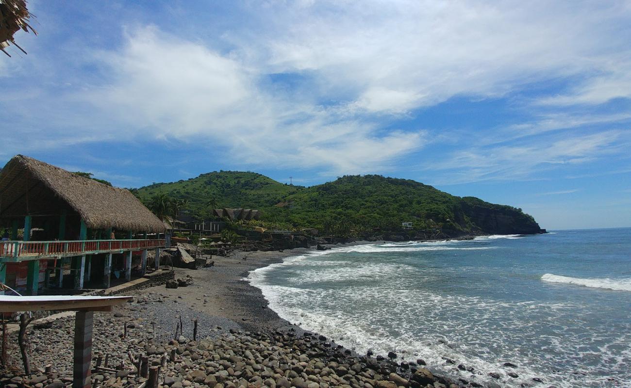 Фото El Zonte beach с песок с галькой поверхностью