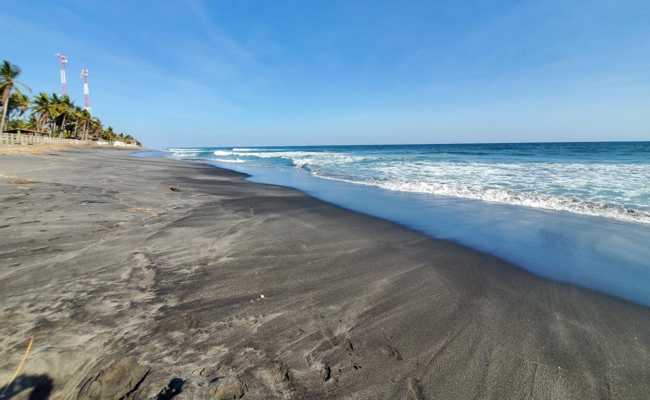 Фото Amatecampo beach с серый песок поверхностью