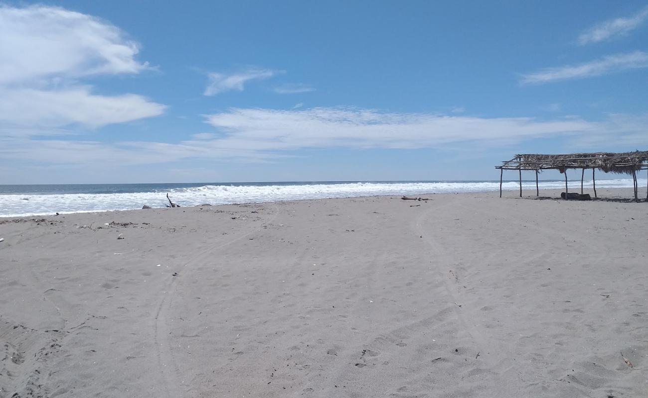 Фото Tasajera beach с серый песок поверхностью