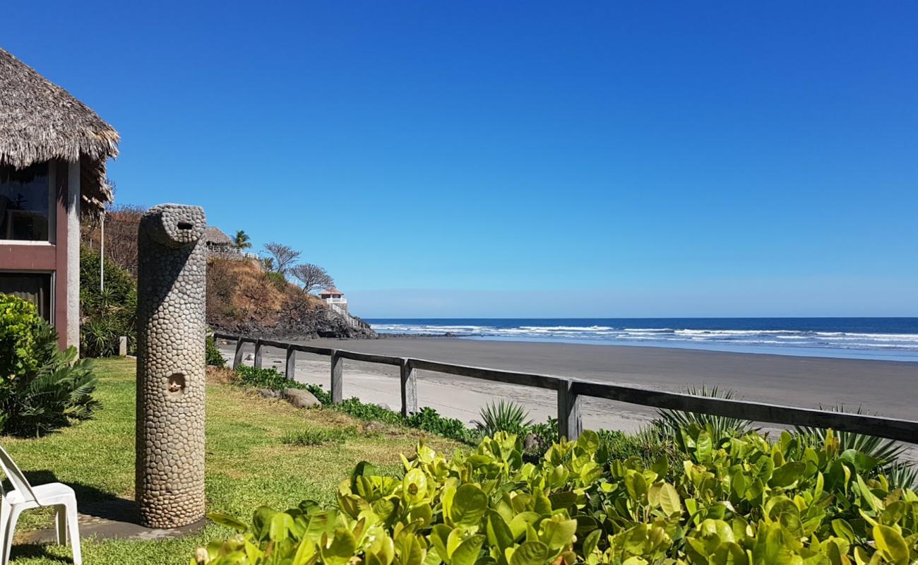 Фото El Carrizal beach с серый песок поверхностью