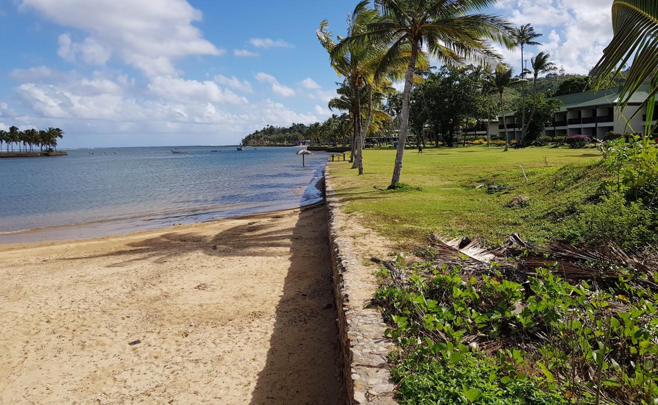 Фото Naviti Beach с светлый песок поверхностью