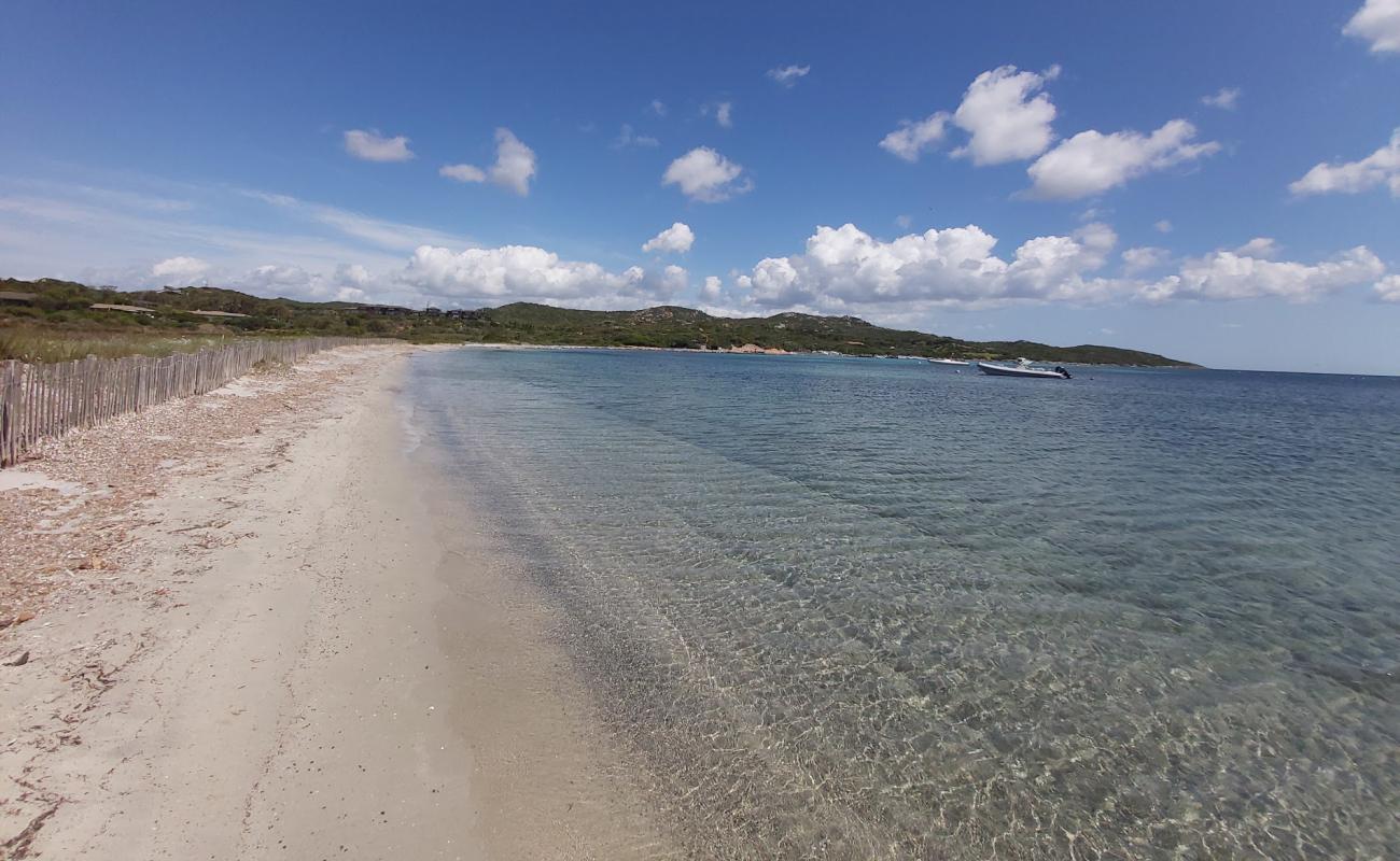 Фото Plage du Piantarella с светлый песок поверхностью