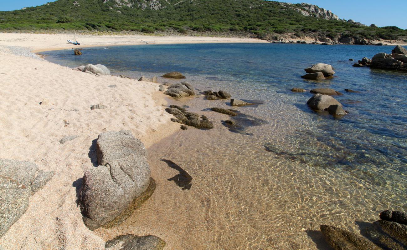 Фото Cala di Conca II с светлый песок поверхностью