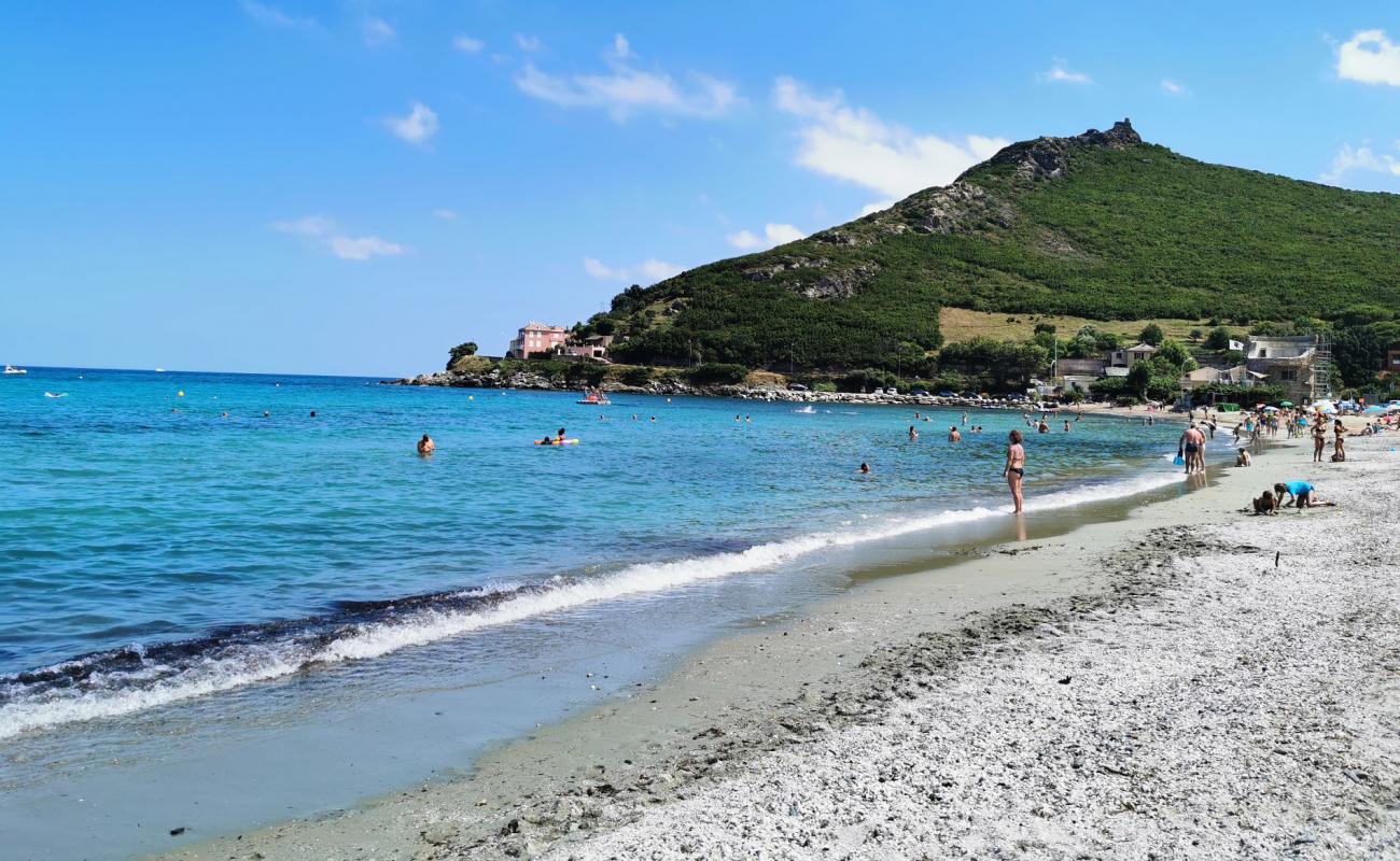 Фото Pietracorbara beach с светлый песок поверхностью