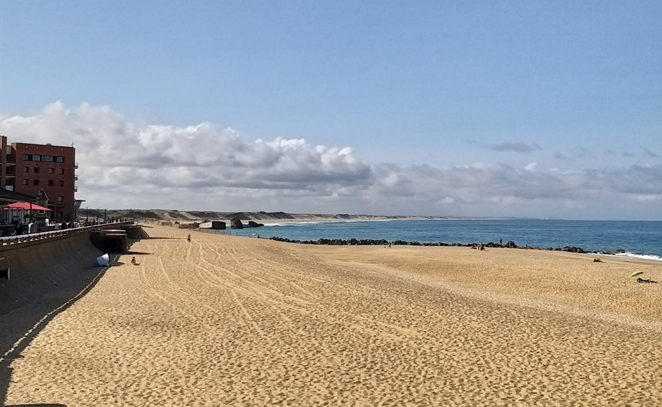 Фото Plage de la Savane с светлый песок поверхностью