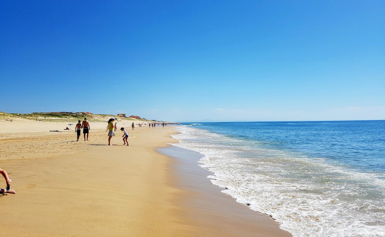 Фото Plage Des Sableres с белый песок поверхностью