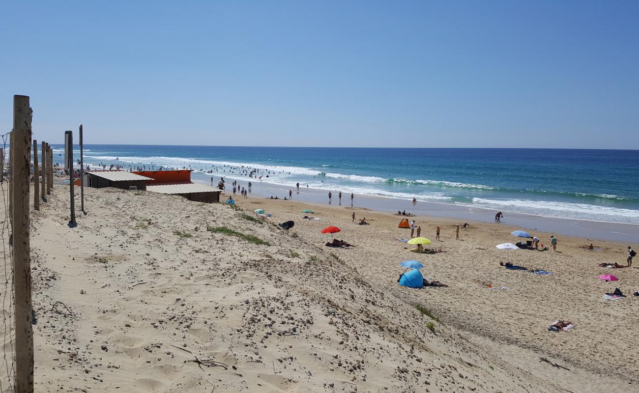 Фото Plage du Vivier с белый чистый песок поверхностью