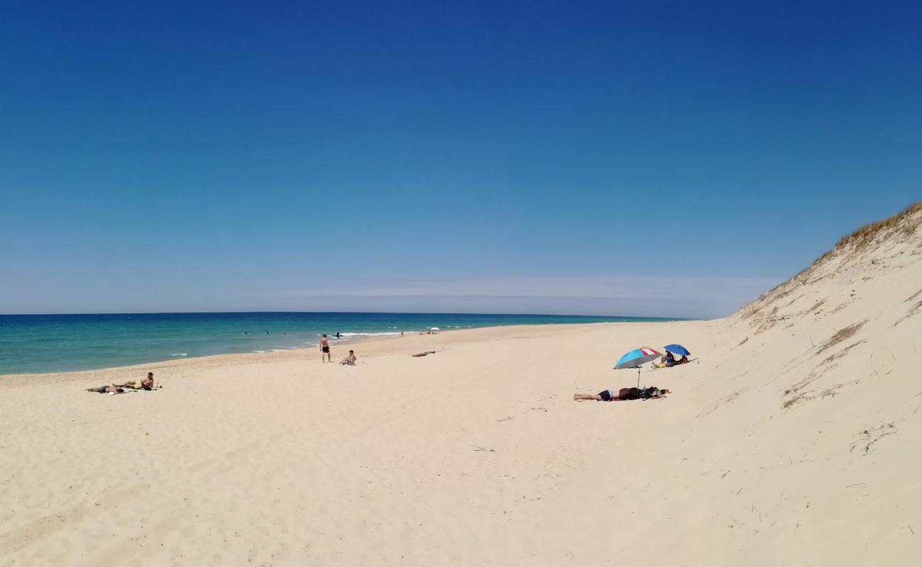 Фото Plage de la Torchere с белый песок поверхностью