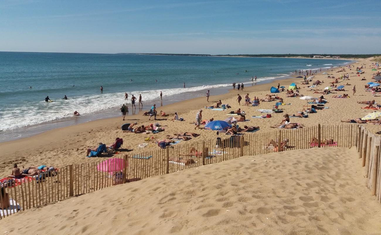 Фото Plage des Conches с светлый песок поверхностью