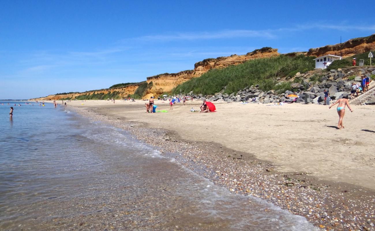 Фото Plage de la Mine d'Or с светлый песок поверхностью