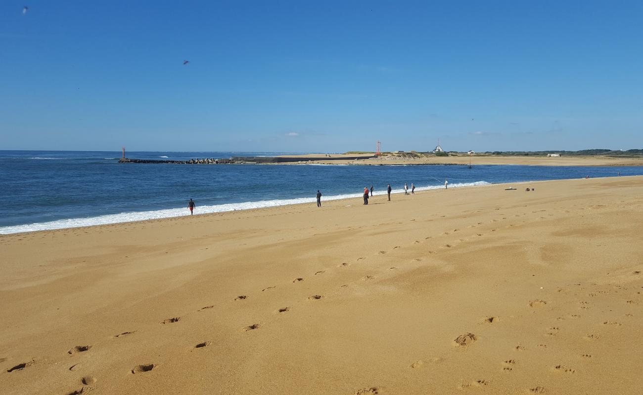 Фото Plage de Kerminihy с светлый песок поверхностью