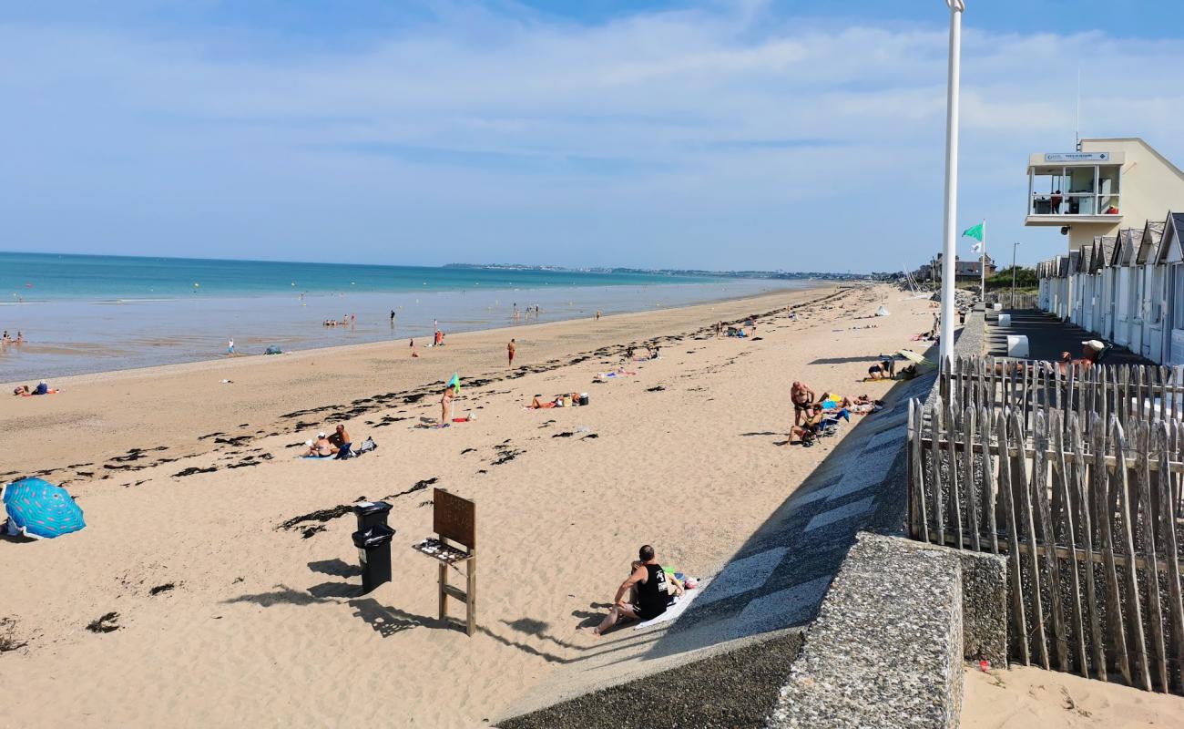 Фото Plage de Carolles-plage с светлый песок поверхностью