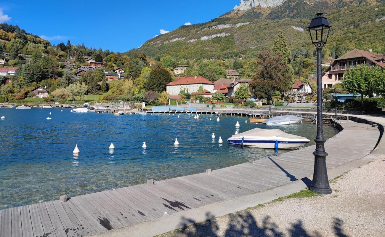 Фото Plage de Baie de Talloires с бетон поверхностью