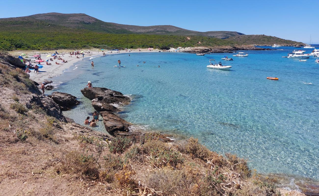 Фото Plage de Cala Francese с светлый песок поверхностью