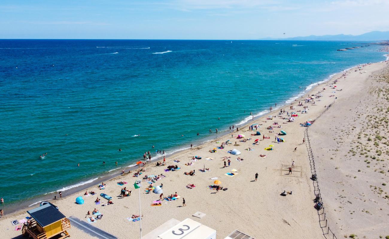 Фото Plage du Lydia с светлый песок поверхностью