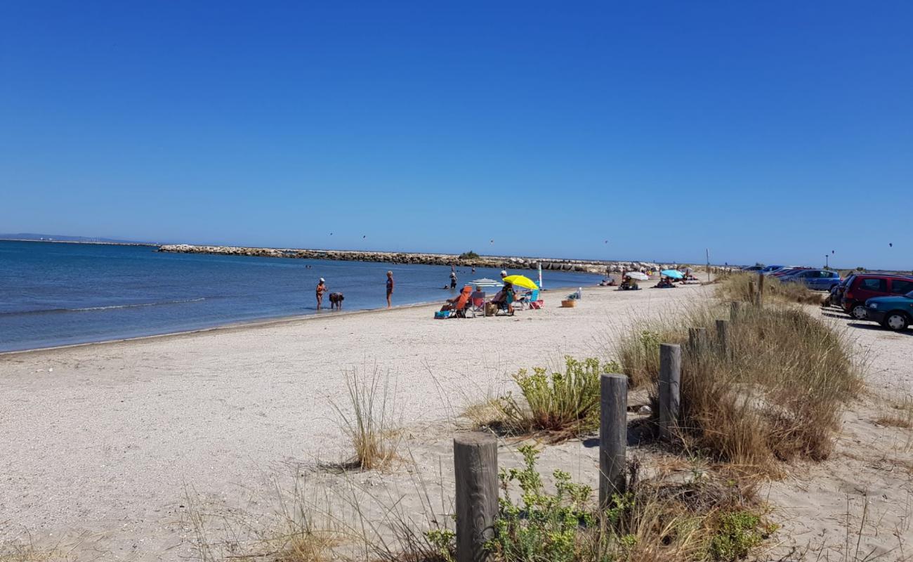 Фото Plage Olga с серая чистая галька поверхностью