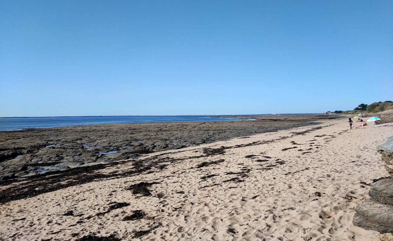 Фото Plage de St. Gildas с светлый песок поверхностью