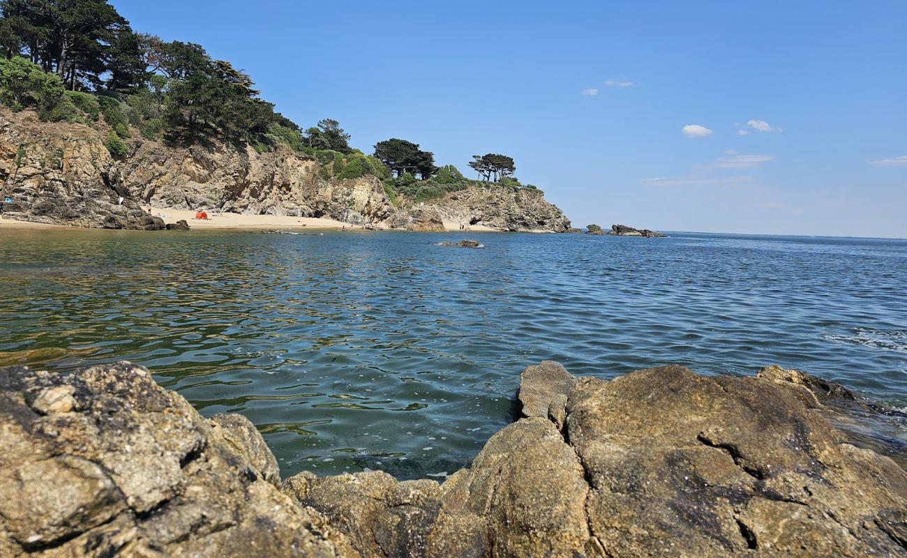 Фото Plage de la Petite Vallee с светлый песок поверхностью