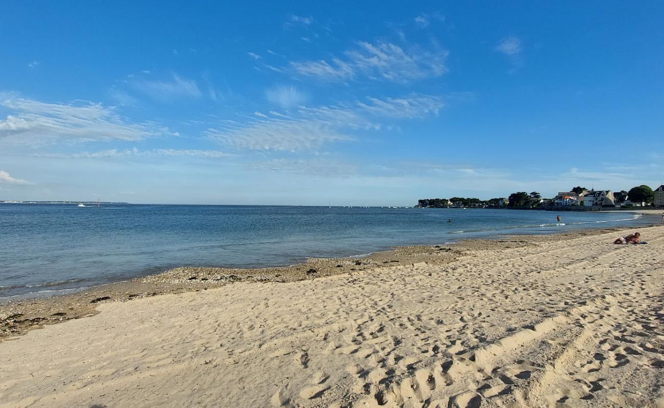 Фото Plage du Nau с светлый песок поверхностью