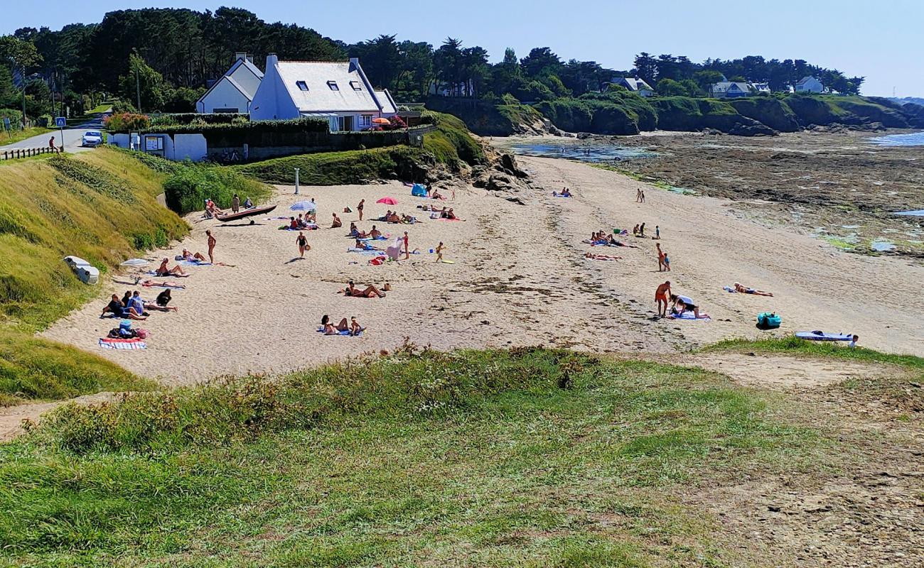 Фото Plage de Toulport с светлый песок поверхностью