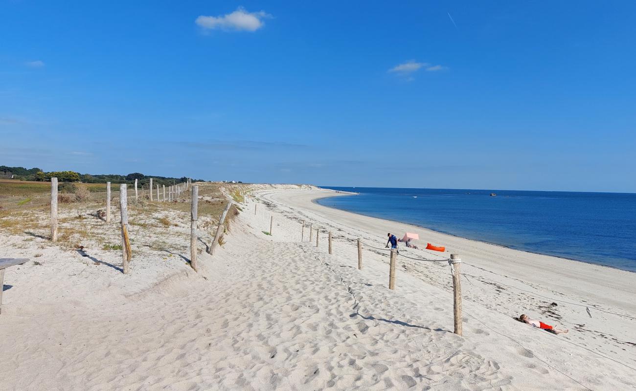 Фото Plage de Skividen с светлый песок поверхностью