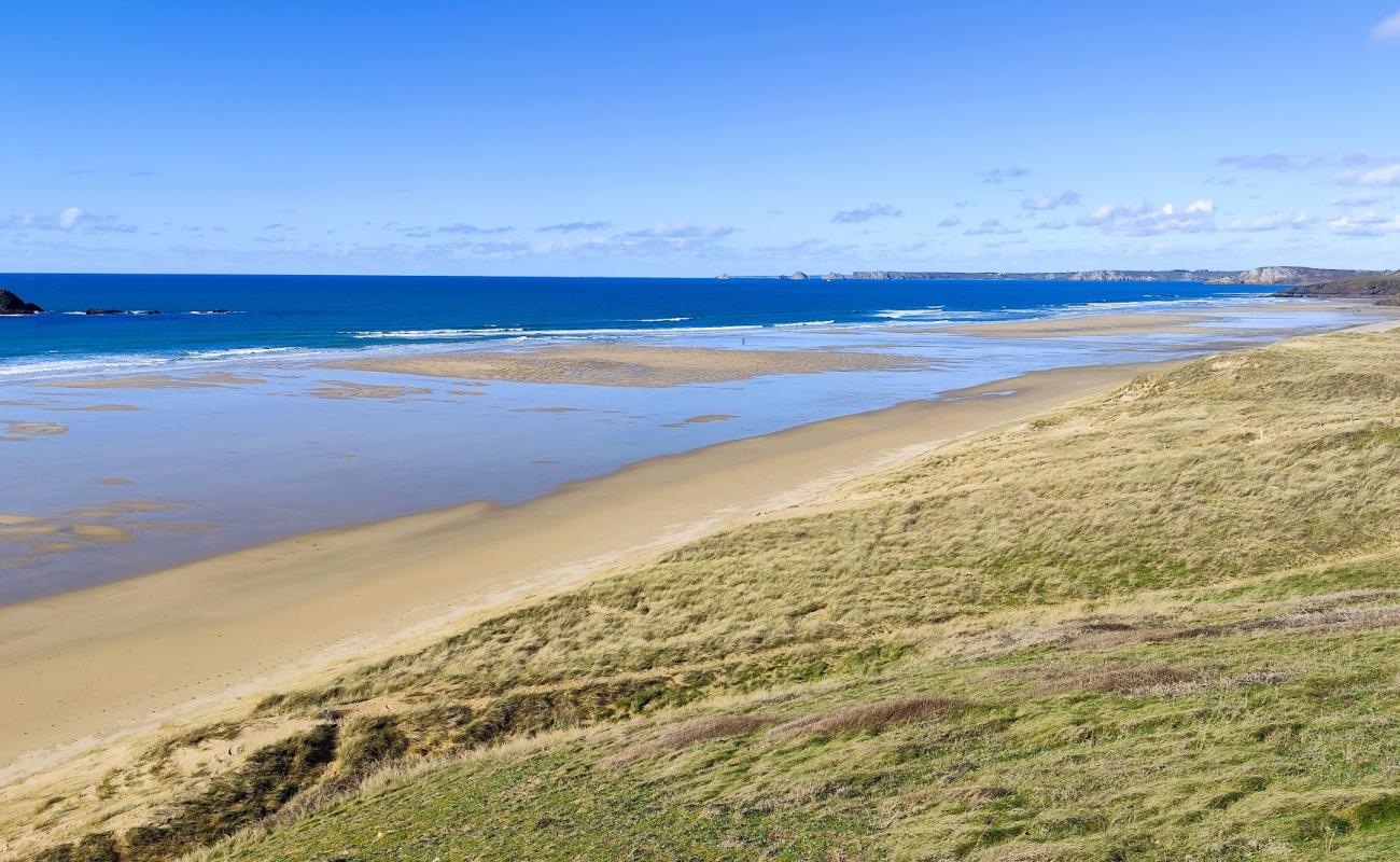 Фото Plage de la Palue с светлый песок поверхностью