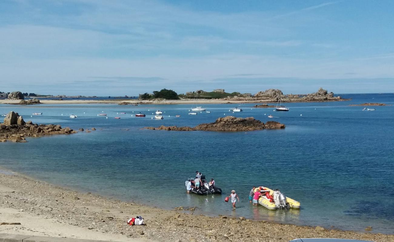 Фото Plage de Pors Scaff с песок с камнями поверхностью