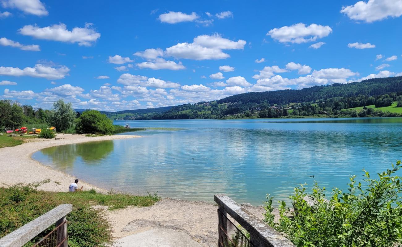 Фото Plage du Saint Point Lac с камни поверхностью