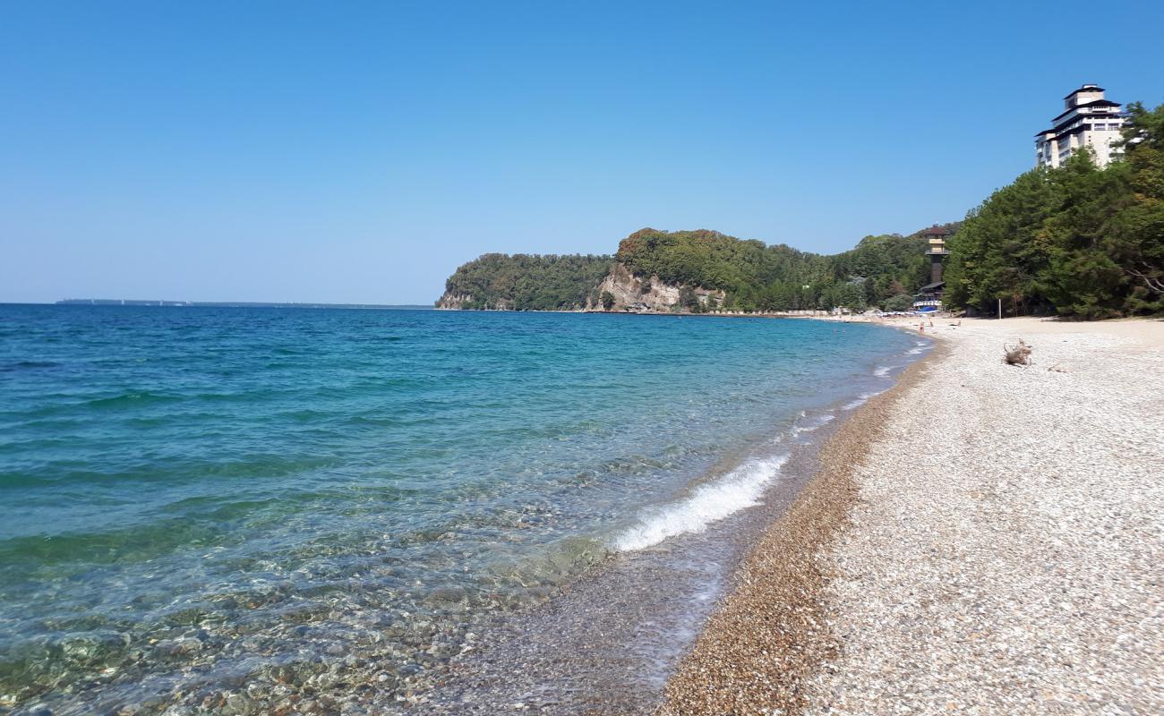 Фото Miussera beach с песок с галькой поверхностью